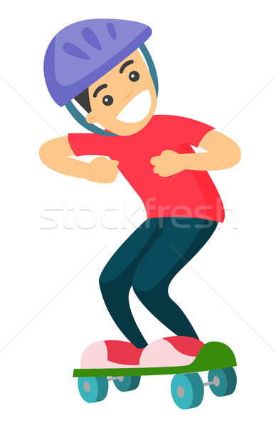 Happy caucasian white boy riding a skateboard. Stock photo © RAStudio