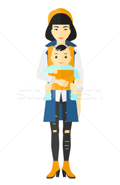 Woman holding baby in sling. Stock photo © RAStudio