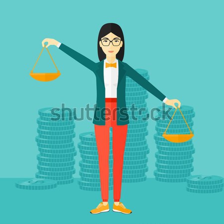 Business woman with scales. Stock photo © RAStudio
