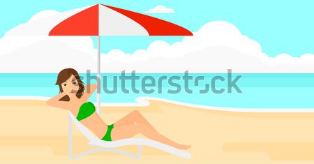 Stock photo: Man sitting in chaise longue.