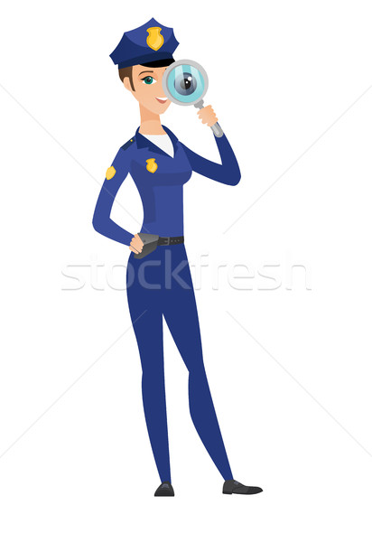 Caucasian female detective with magnifying glass. Stock photo © RAStudio