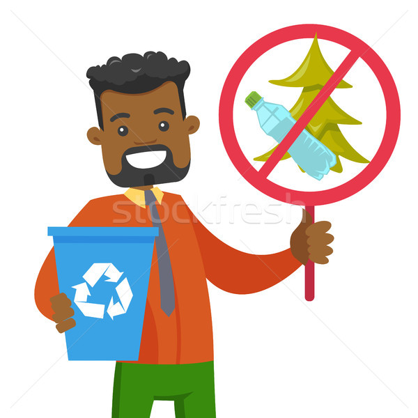 Man holding do not littering in park placard. Stock photo © RAStudio