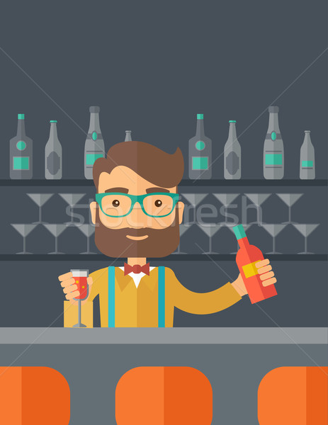 Bartender at the bar holding a drinks. Stock photo © RAStudio