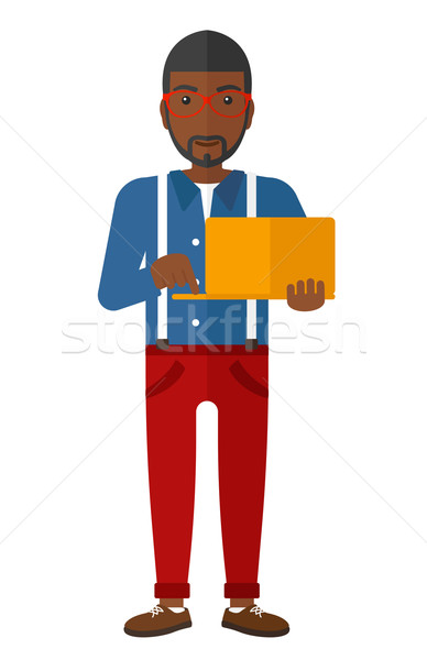 Man using laptop. Stock photo © RAStudio