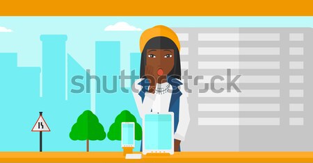 Woman looking at shop window. Stock photo © RAStudio