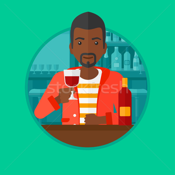 Férfi iszik bor étterem afrikai ül Stock fotó © RAStudio