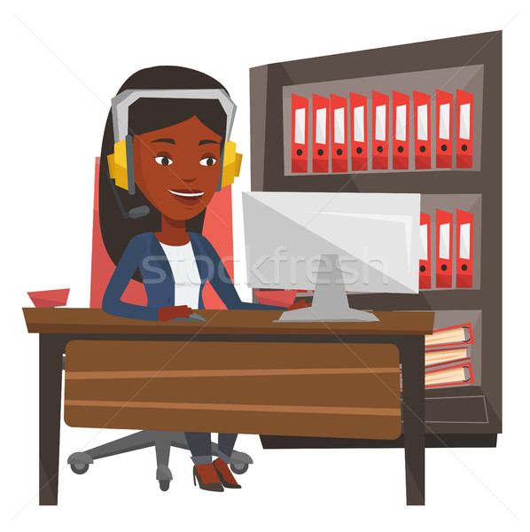 Operator of call center wearing headset. Stock photo © RAStudio