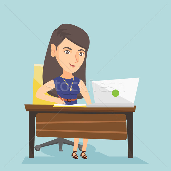 Caucasian student using a laptop for education. Stock photo © RAStudio