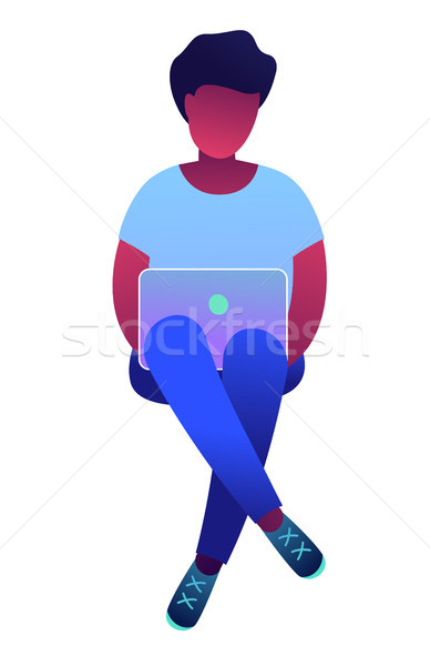 афроамериканец сидят ног глядя ноутбука Сток-фото © RAStudio