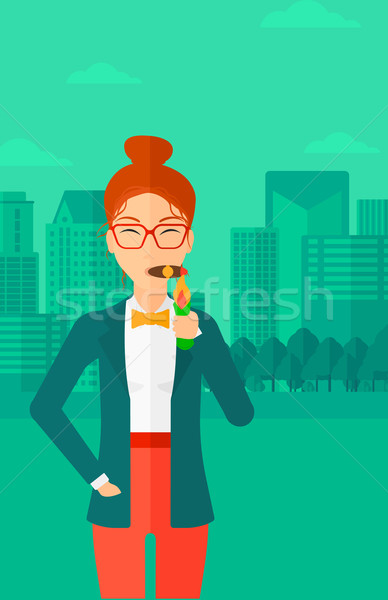 Woman smoking cigar. Stock photo © RAStudio