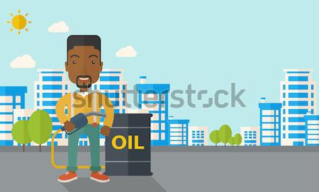 Man with oil can and filling nozzle. Stock photo © RAStudio