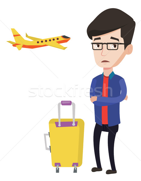 Young man suffering from fear of flying. Stock photo © RAStudio
