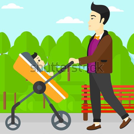 Father walking with his baby in stroller. Stock photo © RAStudio