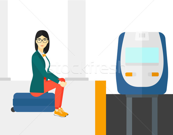 Frau Sitzung Eisenbahn Plattform asian warten Stock foto © RAStudio