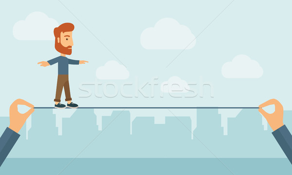 Businessman walking on wire. Stock photo © RAStudio