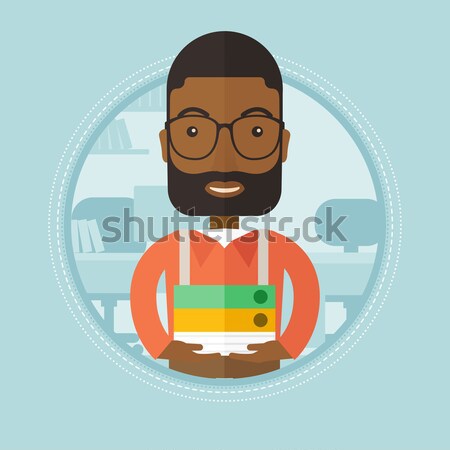 Stock photo: Man with oil barrel and gas pump nozzle.