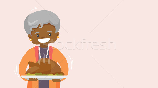 Stock photo: Grandmother with turkey Holiday card, poster.