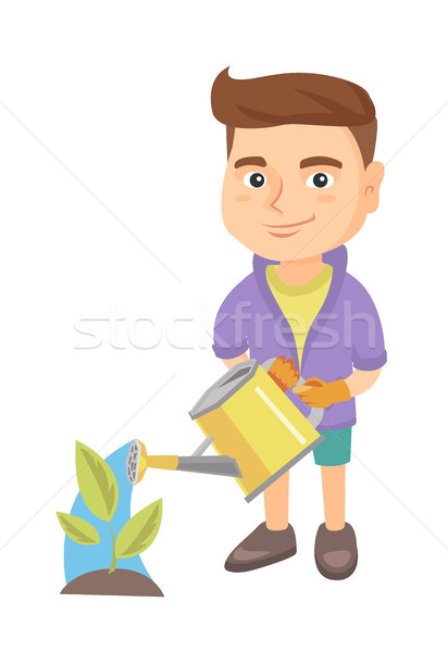 Caucasian boy watering plant with a watering can. Stock photo © RAStudio