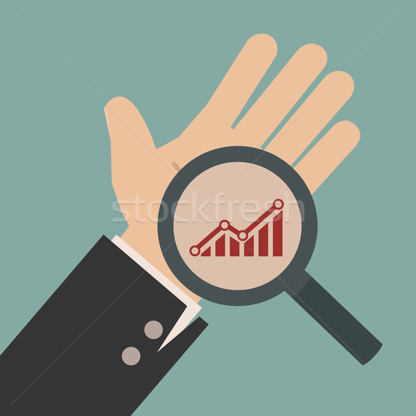 Magnifying glass on graph Stock photo © ratch0013