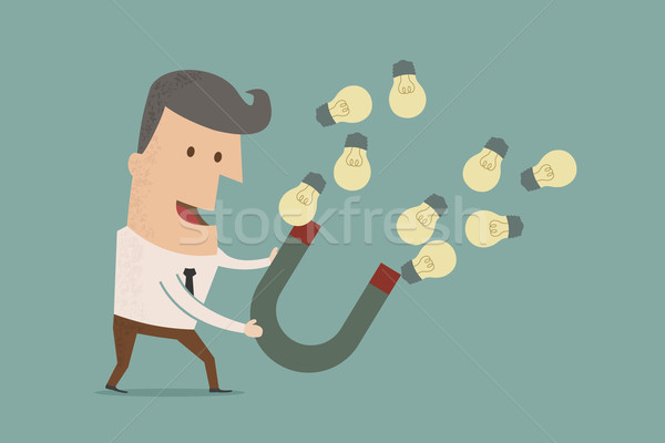 businessman with horseshoe magnet collecting  light bulb , eps10 Stock photo © ratch0013