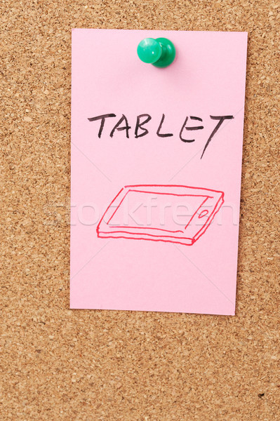 Tablet Wort Symbol gezeichnet Papier Kork Bord Stock foto © raywoo