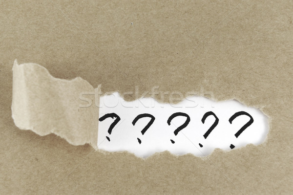 Csoport kérdőjel szakadt papír mögött papír keret Stock fotó © raywoo