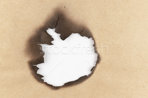 Burnt hole of paper Stock photo © raywoo