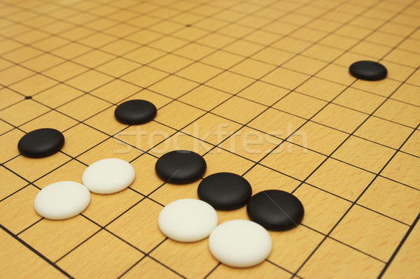 Oyun tahta siyah beyaz taşlar taş siyah Stok fotoğraf © raywoo