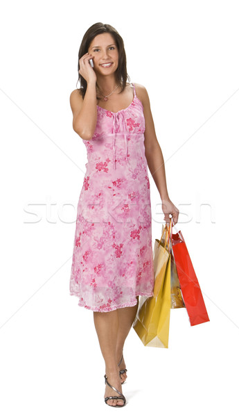 Zakupy komunikacji młoda kobieta telefonu komórkowego kobieta Zdjęcia stock © RazvanPhotography