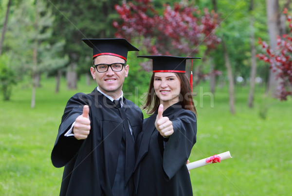 Szczęśliwy para ukończeniu dzień portret studentów Zdjęcia stock © RazvanPhotography