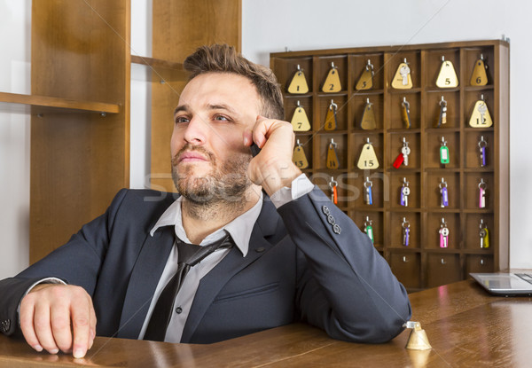 Portre resepsiyonist ciddi telefon büro küçük Stok fotoğraf © RazvanPhotography