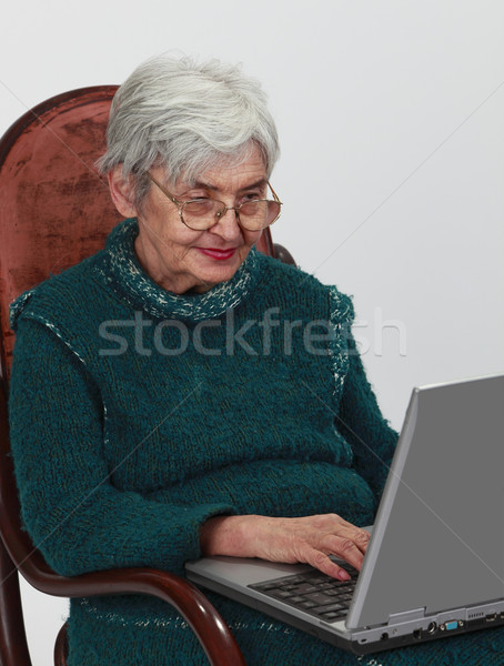 Technologii wszyscy obraz starszy kobieta Zdjęcia stock © RazvanPhotography