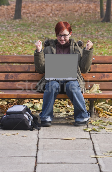 компьютер удовлетворение счастливым девушки ноутбука осень Сток-фото © RazvanPhotography