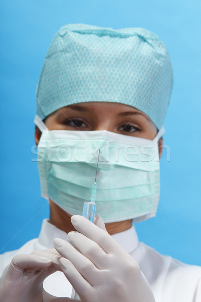 Nurse holding a syringe Stock photo © RazvanPhotography