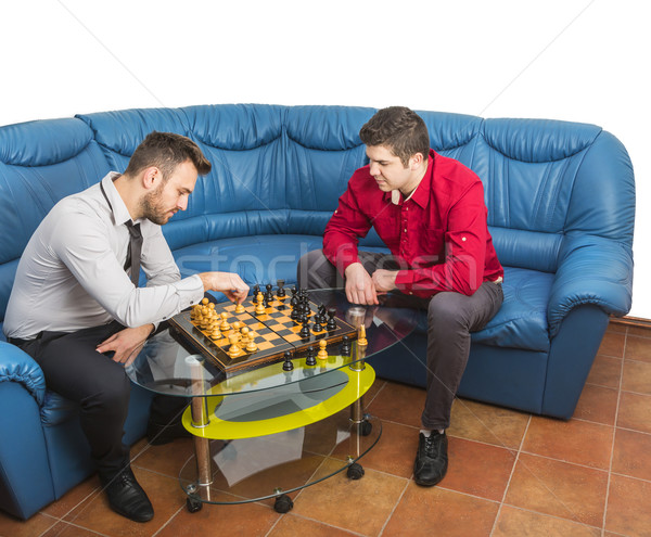 Foto stock: Amigos · jugando · ajedrez · dos · azul · sofá