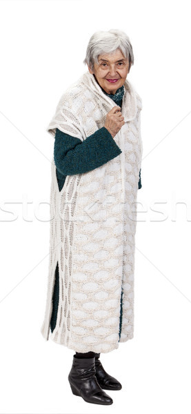 Vieille dame joli tricoté vêtements permanent blanche Photo stock © RazvanPhotography