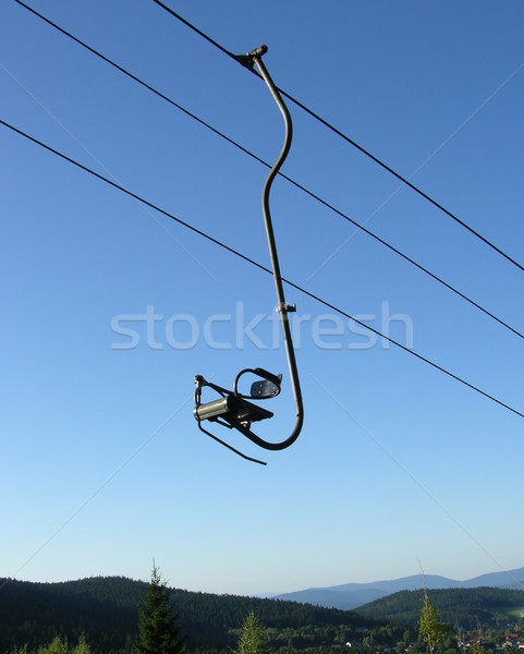 Chair-lift and the blue sky Stock photo © rbiedermann