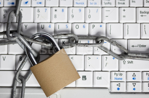 Bezpieczeństwa komputera laptop łańcucha działalności technologii Zdjęcia stock © rbouwman