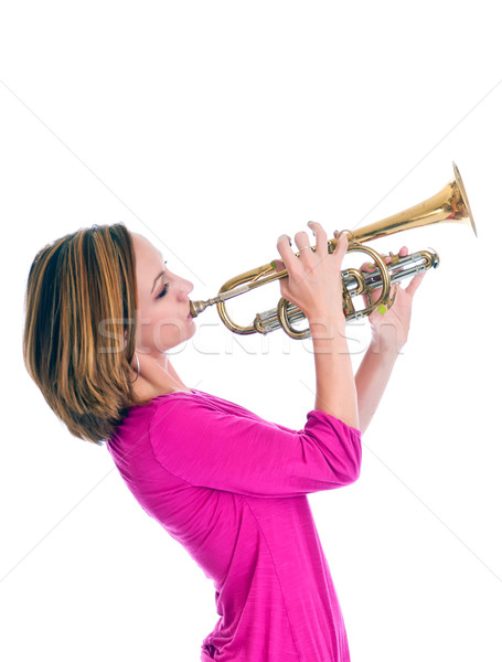 Bastante delgado morena jugando trompeta hermosa Foto stock © rcarner