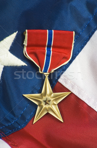 Bronze star on USA flag Stock photo © rcarner