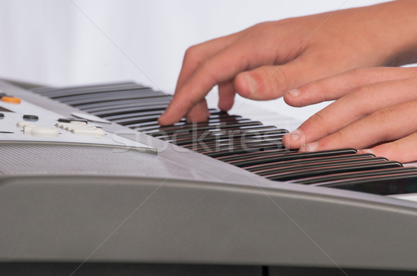 close view of hands on electric keyboard Stock photo © rcarner