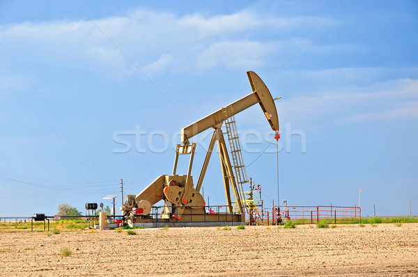Stock photo: Large Pump Jack Pulling Crude Oil Up