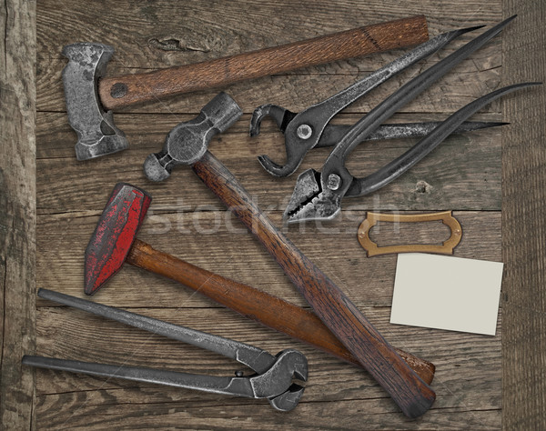 blacksmith tools and business card over bench Stock photo © RedDaxLuma