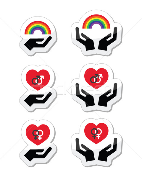 Rainbow, gay and lesbian symbols in heart with hands Stock photo © RedKoala