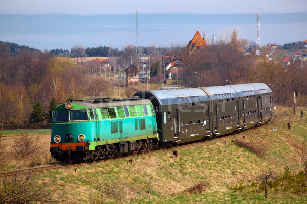 Passenger train passing through countryside Stock photo © remik44992