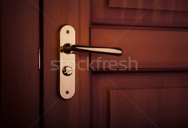 Fából készült ajtó fém fogantyú ház építkezés Stock fotó © restyler