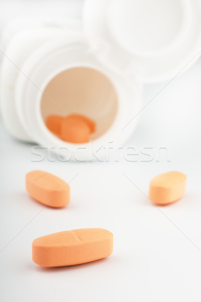 orange tablets with a jar  Stock photo © restyler