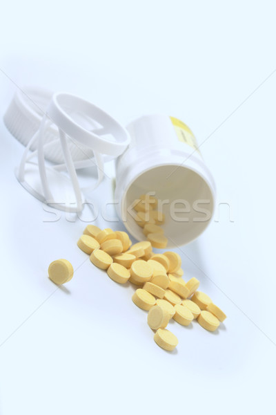 yellow tablets with a jar  Stock photo © restyler