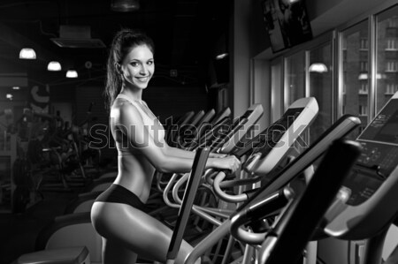 beautiful sexy woman with perfect abdominal muscles at the gym Stock photo © restyler