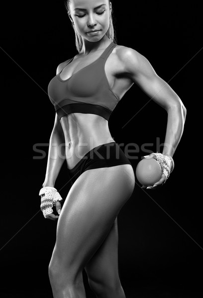 Gyönyörű fitnessz lány tart narancs fitnessz nő Stock fotó © restyler